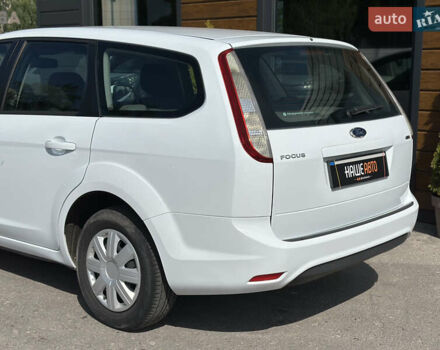 Білий Форд Фокус, об'ємом двигуна 1.56 л та пробігом 311 тис. км за 4700 $, фото 15 на Automoto.ua