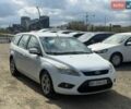 Білий Форд Фокус, об'ємом двигуна 2 л та пробігом 235 тис. км за 5750 $, фото 3 на Automoto.ua