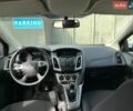 Білий Форд Фокус, об'ємом двигуна 1.56 л та пробігом 256 тис. км за 6150 $, фото 41 на Automoto.ua