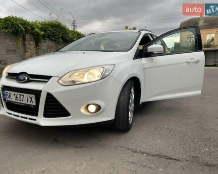 Білий Форд Фокус, об'ємом двигуна 1.56 л та пробігом 220 тис. км за 8499 $, фото 24 на Automoto.ua