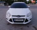 Белый Форд Фокус, объемом двигателя 1.56 л и пробегом 250 тыс. км за 7000 $, фото 1 на Automoto.ua