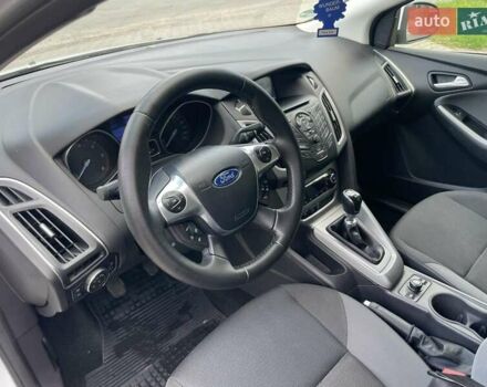 Білий Форд Фокус, об'ємом двигуна 1.56 л та пробігом 220 тис. км за 8499 $, фото 3 на Automoto.ua