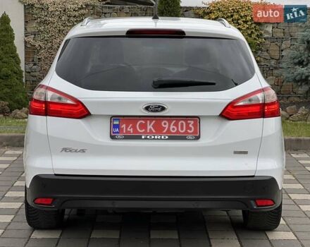 Білий Форд Фокус, об'ємом двигуна 1.6 л та пробігом 211 тис. км за 8750 $, фото 41 на Automoto.ua