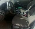Белый Форд Фокус, объемом двигателя 1 л и пробегом 226 тыс. км за 6950 $, фото 6 на Automoto.ua