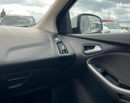 Білий Форд Фокус, об'ємом двигуна 1.6 л та пробігом 263 тис. км за 6790 $, фото 20 на Automoto.ua