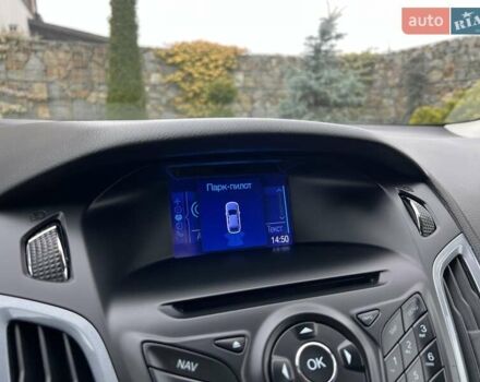 Білий Форд Фокус, об'ємом двигуна 1.6 л та пробігом 211 тис. км за 8750 $, фото 114 на Automoto.ua