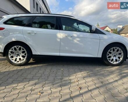 Білий Форд Фокус, об'ємом двигуна 1.56 л та пробігом 220 тис. км за 8499 $, фото 18 на Automoto.ua