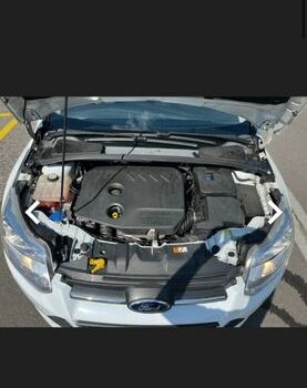 Білий Форд Фокус, об'ємом двигуна 1.56 л та пробігом 211 тис. км за 8000 $, фото 47 на Automoto.ua