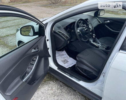 Білий Форд Фокус, об'ємом двигуна 2 л та пробігом 182 тис. км за 9800 $, фото 12 на Automoto.ua