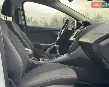 Білий Форд Фокус, об'ємом двигуна 1.6 л та пробігом 221 тис. км за 8699 $, фото 77 на Automoto.ua