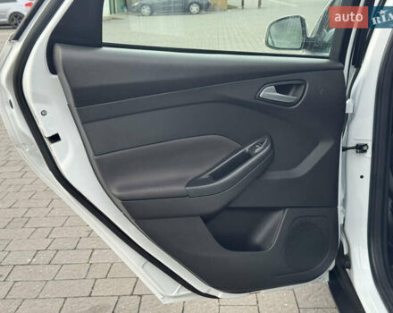 Білий Форд Фокус, об'ємом двигуна 1.6 л та пробігом 221 тис. км за 8699 $, фото 59 на Automoto.ua