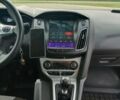 Білий Форд Фокус, об'ємом двигуна 1 л та пробігом 168 тис. км за 6499 $, фото 11 на Automoto.ua