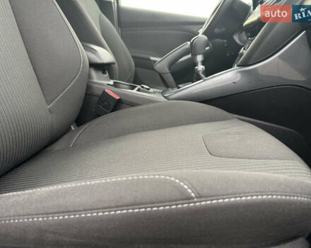Білий Форд Фокус, об'ємом двигуна 1.6 л та пробігом 221 тис. км за 8699 $, фото 79 на Automoto.ua