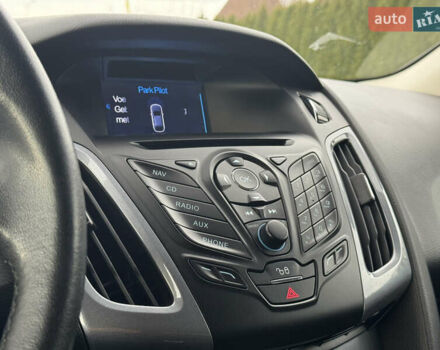 Білий Форд Фокус, об'ємом двигуна 1.6 л та пробігом 221 тис. км за 8699 $, фото 49 на Automoto.ua