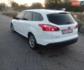 Білий Форд Фокус, об'ємом двигуна 1.56 л та пробігом 242 тис. км за 6550 $, фото 4 на Automoto.ua
