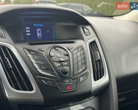 Білий Форд Фокус, об'ємом двигуна 1.6 л та пробігом 221 тис. км за 8699 $, фото 54 на Automoto.ua