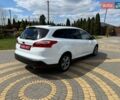 Білий Форд Фокус, об'ємом двигуна 2 л та пробігом 227 тис. км за 8600 $, фото 4 на Automoto.ua