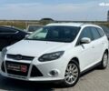Белый Форд Фокус, объемом двигателя 1.6 л и пробегом 314 тыс. км за 8490 $, фото 1 на Automoto.ua