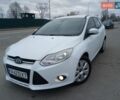 Белый Форд Фокус, объемом двигателя 1.56 л и пробегом 315 тыс. км за 7000 $, фото 1 на Automoto.ua