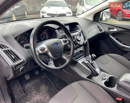 Белый Форд Фокус, объемом двигателя 1 л и пробегом 164 тыс. км за 7700 $, фото 13 на Automoto.ua