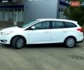 Белый Форд Фокус, объемом двигателя 1.56 л и пробегом 263 тыс. км за 7500 $, фото 1 на Automoto.ua