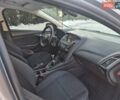 Білий Форд Фокус, об'ємом двигуна 1.5 л та пробігом 243 тис. км за 8999 $, фото 20 на Automoto.ua