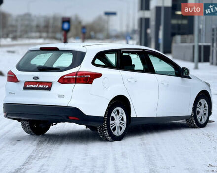 Білий Форд Фокус, об'ємом двигуна 1 л та пробігом 191 тис. км за 7999 $, фото 4 на Automoto.ua