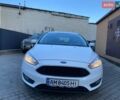 Білий Форд Фокус, об'ємом двигуна 1.5 л та пробігом 215 тис. км за 9400 $, фото 1 на Automoto.ua