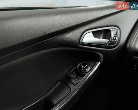 Білий Форд Фокус, об'ємом двигуна 1 л та пробігом 191 тис. км за 7999 $, фото 15 на Automoto.ua