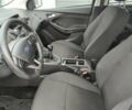 Белый Форд Фокус, объемом двигателя 1 л и пробегом 210 тыс. км за 7900 $, фото 9 на Automoto.ua