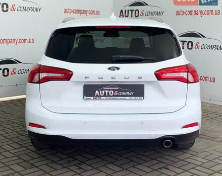 Білий Форд Фокус, об'ємом двигуна 2 л та пробігом 180 тис. км за 14950 $, фото 3 на Automoto.ua
