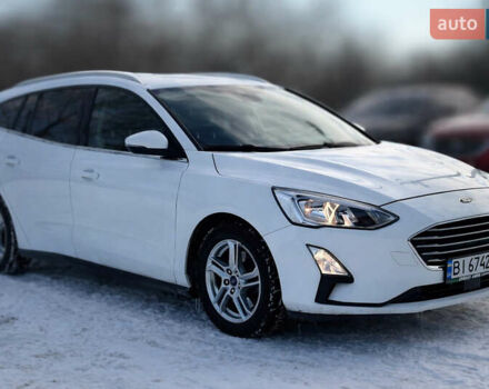 Белый Форд Фокус, объемом двигателя 1.5 л и пробегом 239 тыс. км за 12100 $, фото 1 на Automoto.ua