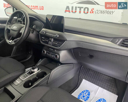 Білий Форд Фокус, об'ємом двигуна 2 л та пробігом 180 тис. км за 14950 $, фото 7 на Automoto.ua