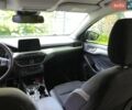 Білий Форд Фокус, об'ємом двигуна 2 л та пробігом 206 тис. км за 12000 $, фото 21 на Automoto.ua