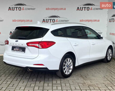 Білий Форд Фокус, об'ємом двигуна 2 л та пробігом 180 тис. км за 14950 $, фото 2 на Automoto.ua