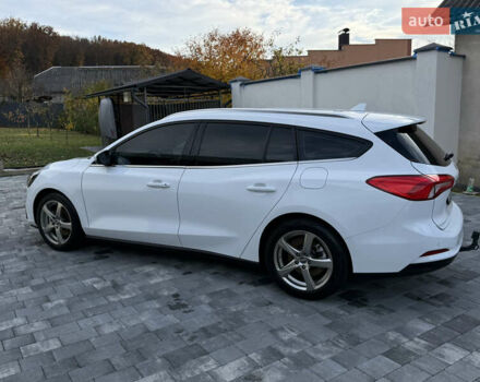 Білий Форд Фокус, об'ємом двигуна 1.5 л та пробігом 205 тис. км за 12400 $, фото 1 на Automoto.ua
