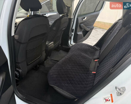 Білий Форд Фокус, об'ємом двигуна 1.5 л та пробігом 205 тис. км за 12400 $, фото 15 на Automoto.ua