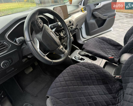 Білий Форд Фокус, об'ємом двигуна 1.5 л та пробігом 205 тис. км за 12400 $, фото 14 на Automoto.ua