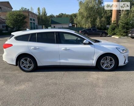 Белый Форд Фокус, объемом двигателя 1.5 л и пробегом 218 тыс. км за 13000 $, фото 5 на Automoto.ua