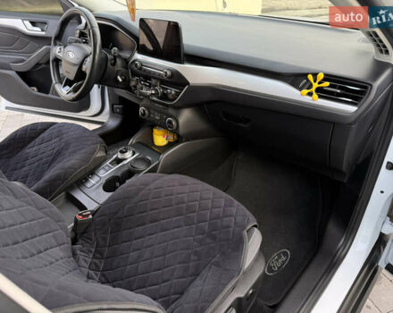 Білий Форд Фокус, об'ємом двигуна 1.5 л та пробігом 205 тис. км за 12400 $, фото 7 на Automoto.ua