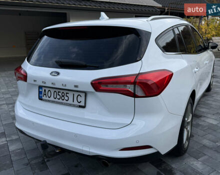 Білий Форд Фокус, об'ємом двигуна 1.5 л та пробігом 205 тис. км за 12400 $, фото 3 на Automoto.ua
