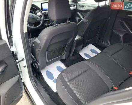 Белый Форд Фокус, объемом двигателя 1.5 л и пробегом 190 тыс. км за 14500 $, фото 22 на Automoto.ua