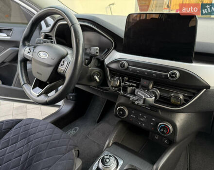Білий Форд Фокус, об'ємом двигуна 1.5 л та пробігом 205 тис. км за 12400 $, фото 6 на Automoto.ua