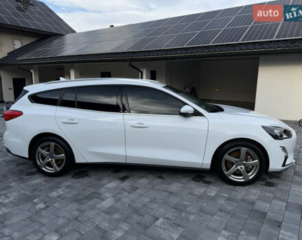 Білий Форд Фокус, об'ємом двигуна 1.5 л та пробігом 205 тис. км за 12400 $, фото 4 на Automoto.ua