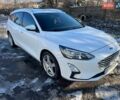 Білий Форд Фокус, об'ємом двигуна 1.5 л та пробігом 244 тис. км за 13300 $, фото 1 на Automoto.ua