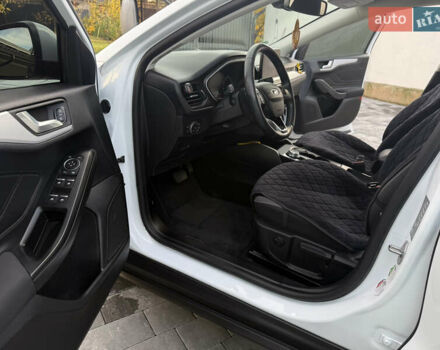 Білий Форд Фокус, об'ємом двигуна 1.5 л та пробігом 205 тис. км за 12400 $, фото 13 на Automoto.ua