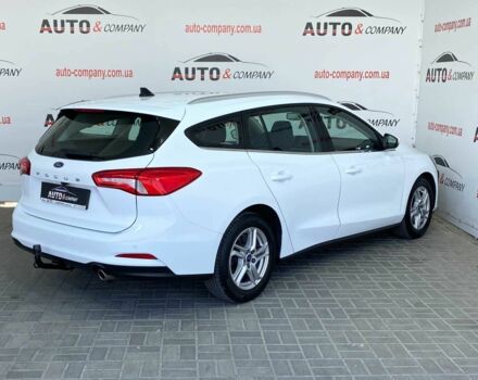 Белый Форд Фокус, объемом двигателя 1.5 л и пробегом 194 тыс. км за 13950 $, фото 2 на Automoto.ua