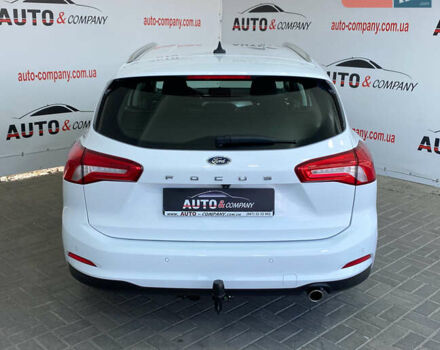 Белый Форд Фокус, объемом двигателя 1.5 л и пробегом 194 тыс. км за 13950 $, фото 3 на Automoto.ua