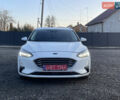 Белый Форд Фокус, объемом двигателя 1.5 л и пробегом 152 тыс. км за 13700 $, фото 1 на Automoto.ua