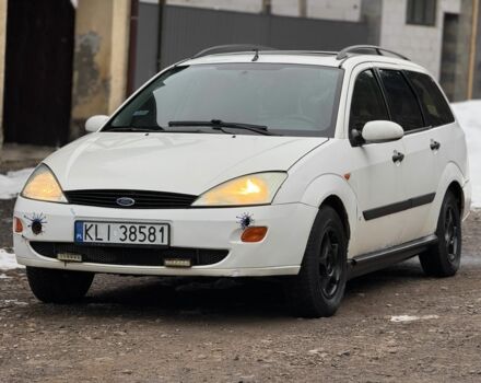 Белый Форд Фокус, объемом двигателя 1.8 л и пробегом 216 тыс. км за 1000 $, фото 1 на Automoto.ua
